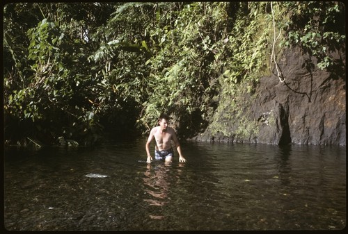 Man bathing in a lake