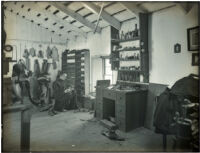 Interior of the shoe shop at Mission Santa Barbara, Santa Barbara, circa 1898-1900