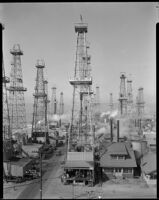 View of the Venice oil field with the ocean on the left, Los Angeles, 1930