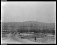 View towards the town of Avenal in the Salinas valley with the Santa Lucia mountain range in the distance, Avenal, circa 1929