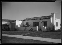 Exterior view of an unidentified Spanish style house, California