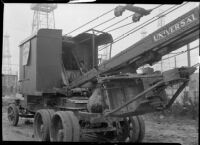 Maaco Construction Company truck crane parked at an oil field, Los Angeles, circa 1930