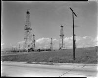 View of Stockburger oil wells at the Playa del Rey oil field, Los Angeles, circa 1930-1939