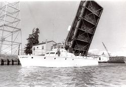 D Street bridge in Petaluma, California raised to allow a boat to pass, 1973