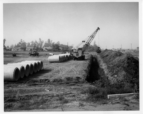 Photograph of drainage construction for the Bargin Basket Shopping Center