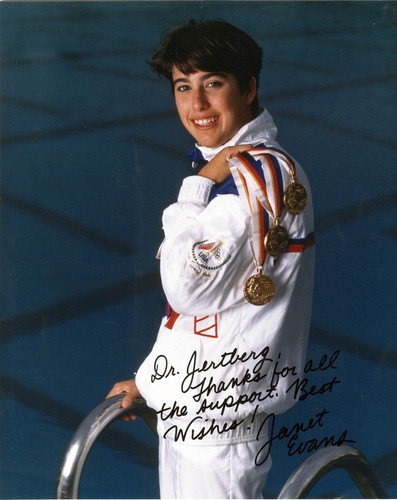 Photograph of Janet Evans with her Olympic gold medals