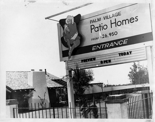 Photograph of sign advertising Palm Village Patio Homes