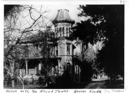 Photograph of house with round tower