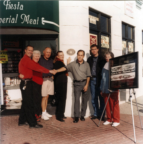 Photograph of placing of historic plaque on the Kraemer Building