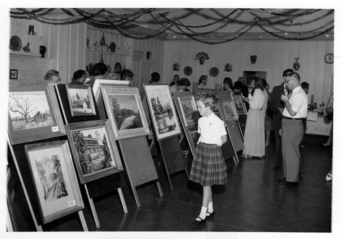 Photograph of works on display at the Placentia Art Show