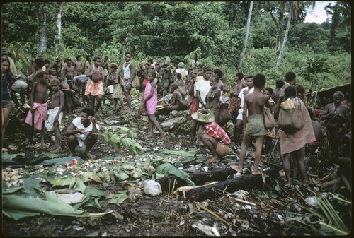 Feast at kastom occassion, in Ngarinaasuru, with Christian-style food presentation on leaf rows