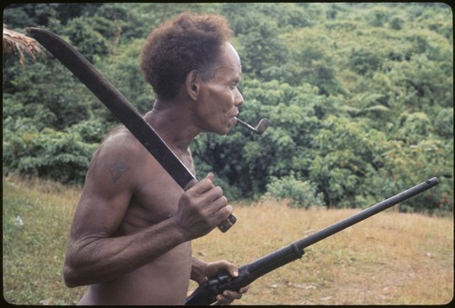 Elota with old Snider rifle and bush knife