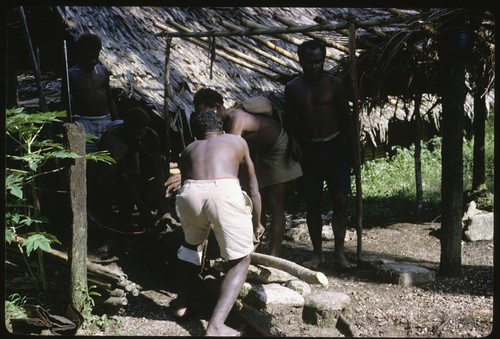 Carrying body to the shrine for burial