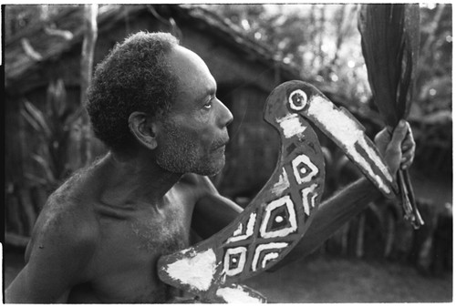 Ma'aanamae of 'Ai'eda posing with a taba dancestick from sango dancing