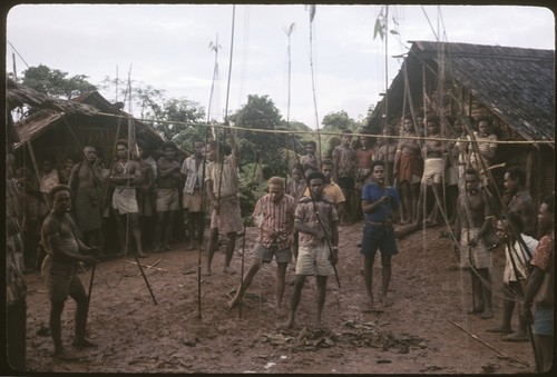 Men making speeches with shell money