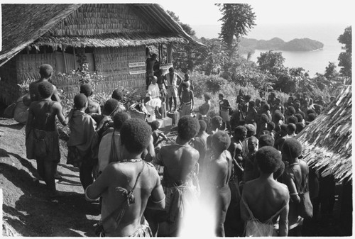 Polling station at Ngarinaasuru, above Sinalagu Harbour in background