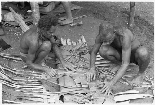 Kwaa'ala and Basuka wrapping up the pudding