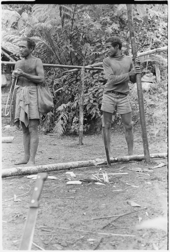 Men working on house frame