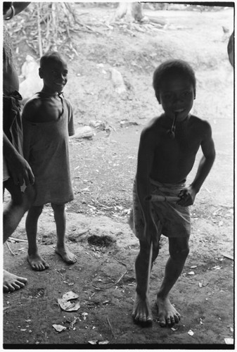 Two boys, one practicing sango dancing at Laloe'efou