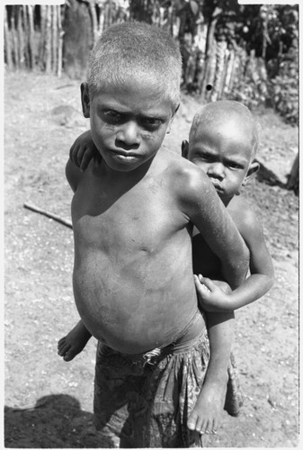 Children in clearing at Gwagwani'ulou hamlet