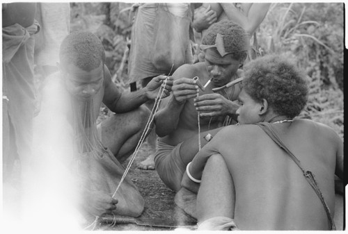 Batalamo puts bata together to pay a debt. Men with shell money at Furii'au III