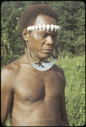 Man with dafi on neck and tale'ekalango on forehead