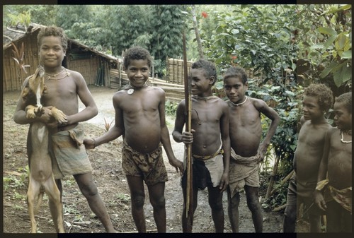 Boys with dog and bow