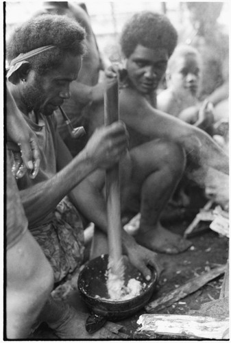 Preparing food around the fire