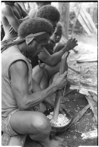 Preparing food around the fire