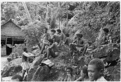 People sitting on rocks at Gelebasi