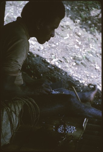 Man (Larikeni) working on shell money