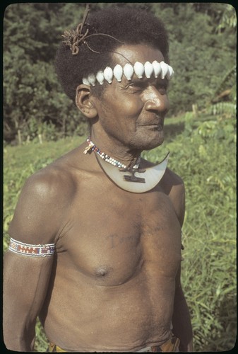 Man with dafi on neck and tale'ekalango on forehead