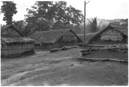 Houses in what appears to be a coastal Christian village, likely not in Kwaio