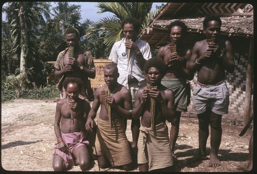 Men posing with panpipes