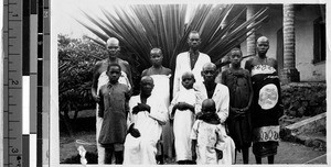 Family portrait in front of a house, Africa, April 29, 1947