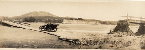 Crossing a temporary bridge on a dry bed