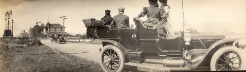 Automobiles on the road outside the town of Warm Springs