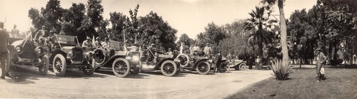 Cars parked during a race, possibly part of the Stanford racing team