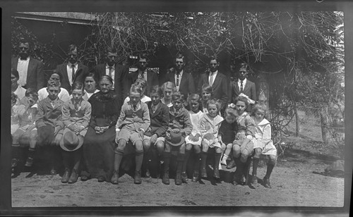 Group in suits and dresses