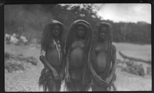 Girls with long hair style, on a beach