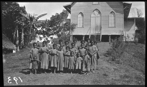 Girls with nuns in front of church at Dilava Catholic mission