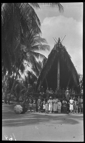 European visitors to a village, possibly Mekeo