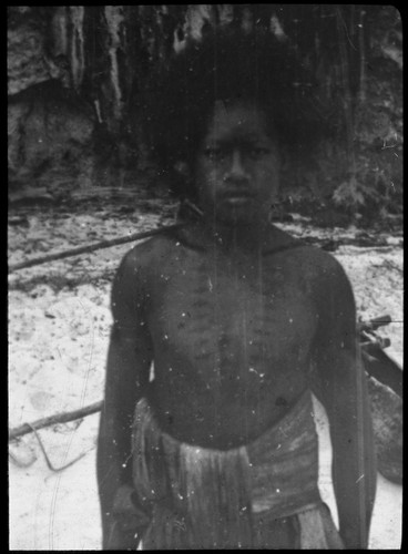 Portrait of a young man with a canoe