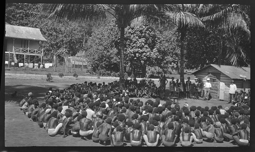 Hookworm lecture, probably to group of plantation workers