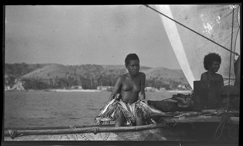 Women on a large sailing canoe