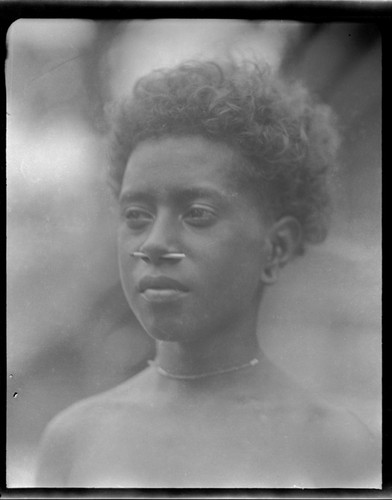 Portrait of young woman wearing nose pin