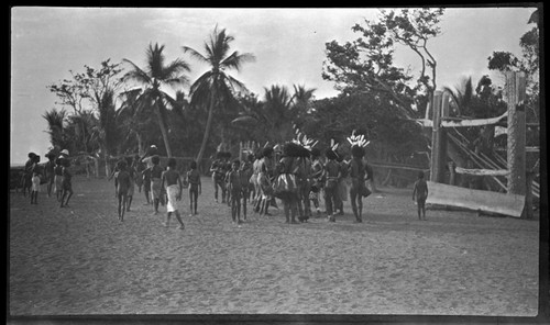 Motu people dancing in costume near dubu platform, at Gaile, Central Province