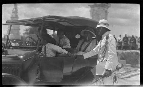 Queen Salote of Tonga, in vehicle with others