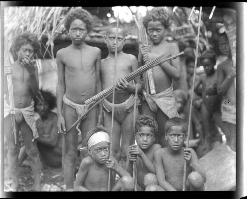 Group portrait, children with spears and arrows