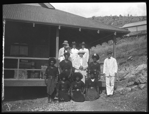 Director of Papua Health Services and Lambert's health survey assistants; H on uniforms stands for Hookworm